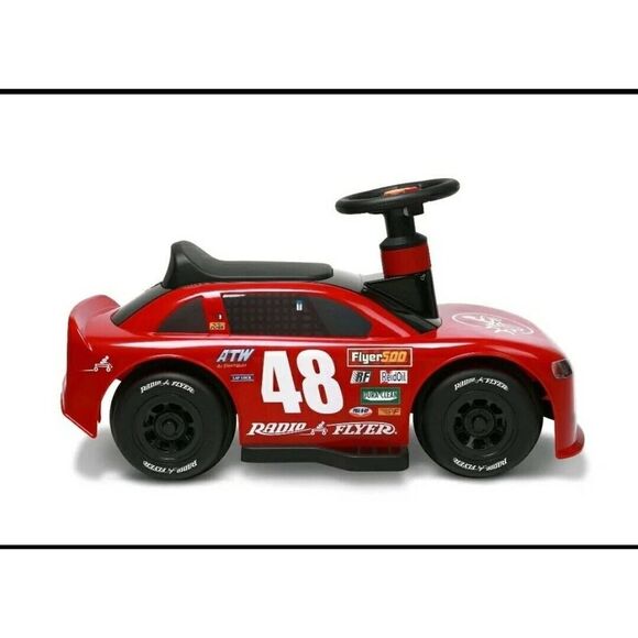 Radio Flyer 6v Racer Ride On Car for toddlers with round printed playmat - Picture 4 of 11